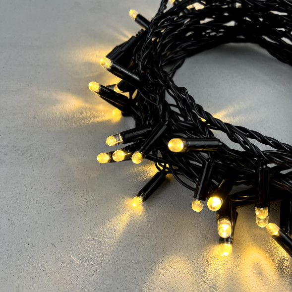 Светодиодная гирлянда с колпачком 100 теплых белых LED ламп 10 м., 24В., черный провод ПВХ, IP65, LTC (PST100CAP-11-1WW) 