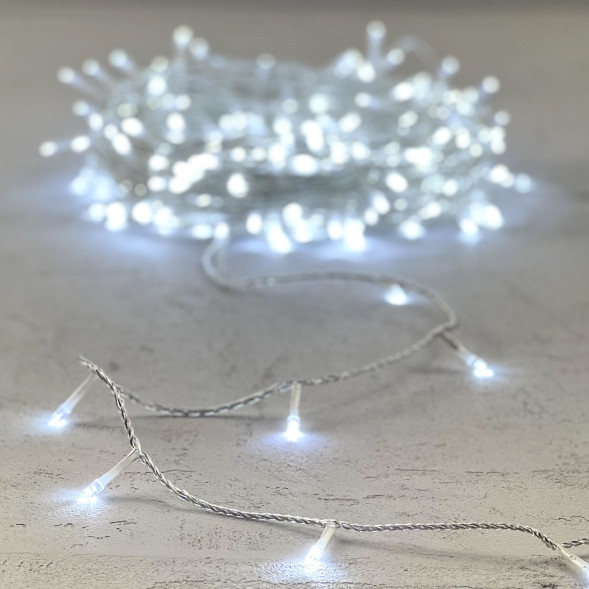 Светодиодная гирлянда 20 м., 200 холодных белых LED ламп, 24V., прозрачный силиконовый провод, IP65, Beauty Led (EST200-10-1W) 
