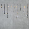 Светодиодная бахрома с колпачком 3,1*0,5 м., 120 желтых белых LED ламп, мерцание, каучуковый черный провод, LTC (LL120BLW-1-2Y)
