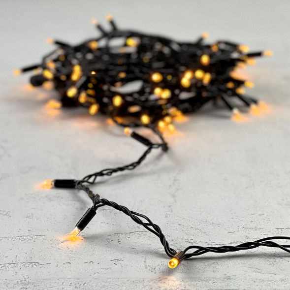 Светодиодная гирлянда с колпачком 100 желтых LED ламп 10 м., 24В., черный провод ПВХ, IP65, LTC (PST100CAP-11-1Y) 