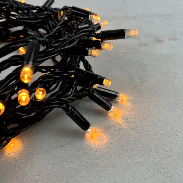 Светодиодная гирлянда с колпачком 100 желтых LED ламп 10 м., 24В., черный провод ПВХ, IP65, LTC (PST100CAP-11-1Y) 