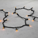 Светодиодная гирлянда с колпачком 100 желтых LED ламп 10 м., 24В., черный провод ПВХ, IP65, LTC (PST100CAP-11-1Y) 
