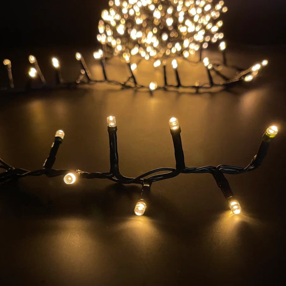 Светодиодная нить Snake Light 2000 теплых ламп, 40 м., 24В, 8 режимов, зеленый провод, для елки 260-300 см., Christmas DeLuxe (85745) 