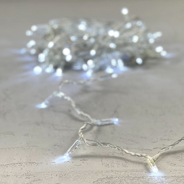 Светодиодная гирлянда с колпачком 100 холодных белых LED ламп 10 м., мерцание, 24В., прозрачный провод ПВХ, IP65, LTC (PST100BLWCAP-10-1W) 