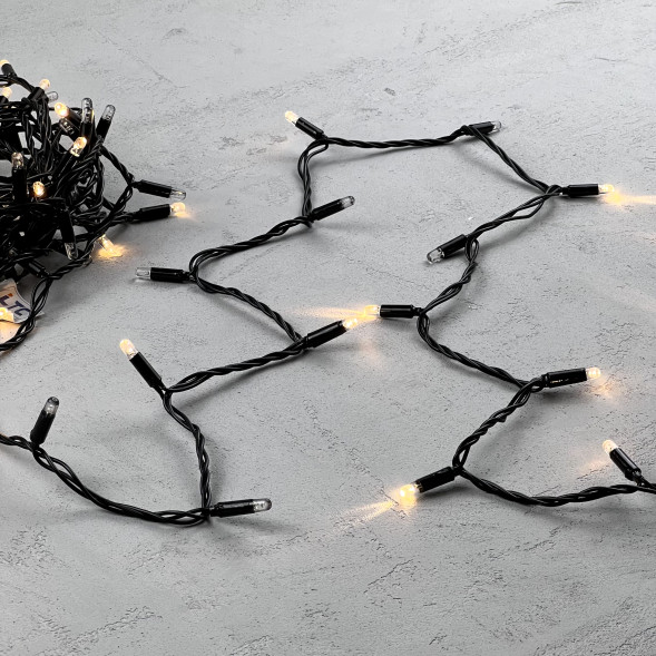 Светодиодная гирлянда с колпачком 100 теплых белых LED ламп 10 м., мерцание каждого диода, 24В., черный провод ПВХ, IP65, LTC (PST100ABLCAP-11-1WW) 