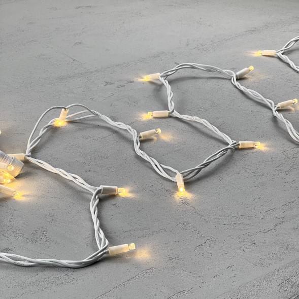 Светодиодная гирлянда с колпачком 75 теплых белых LED ламп 10 м., 24В., белый каучуковый провод, IP65, LTC (LL75-8-1WW) 