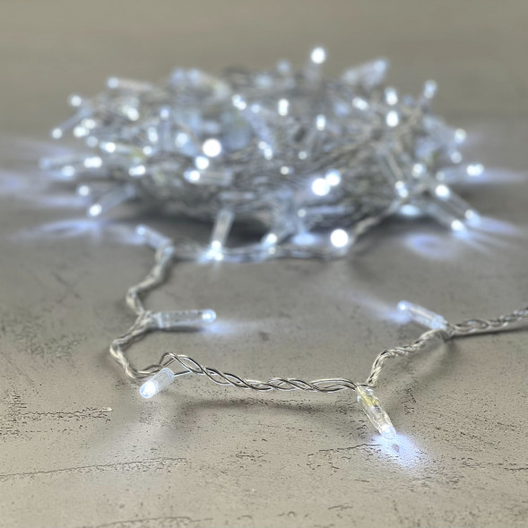 Светодиодная гирлянда с колпачком 100 холодных белых LED ламп 10 м., 24В., прозрачный провод ПВХ, IP65, LTC (PST100CAP-10-1W) 