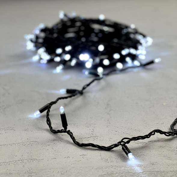 Светодиодная гирлянда с колпачком 100 холодных белых LED ламп 10 м., мерцание, 220-230 В., черный провод ПВХ, IP65, LTC (PST100BLWCAP-11-2W) 