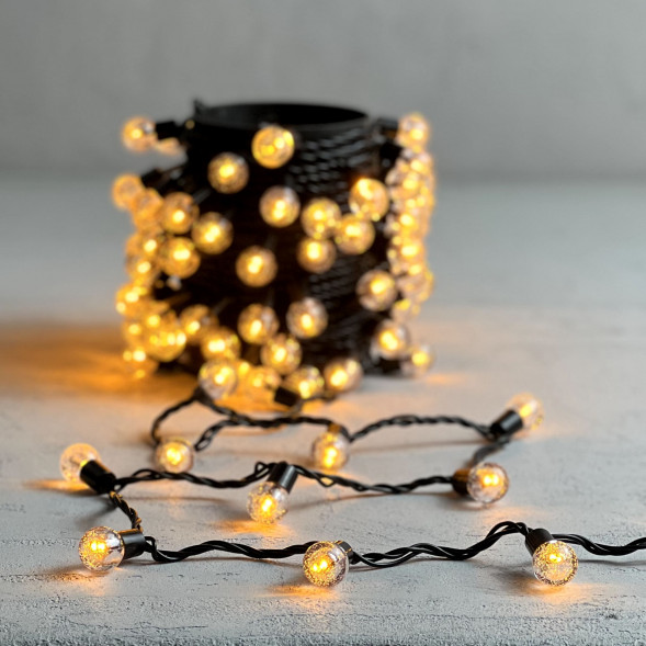 Светодиодная гирлянда шарики Пузырьки 10 м., 220V., 100 желтых LED ламп 23 мм., коннектор, черный ПВХ, LTC (PCS-100B-Y) 