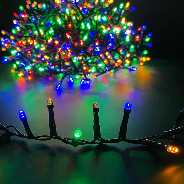 Светодиодная нить Snake Light 700 разноцветных ламп, 14 м., 24В, 8 режимов, зеленый провод, для елки 215 см., Christmas DeLuxe (83778) 