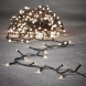 Светодиодная нить String Light 368 теплых ламп, 27.6 м., на батарейках, таймер, зеленый провод, Luca (83791) 