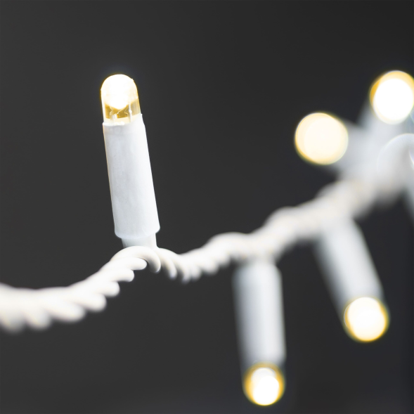 Светодиодная нить 10 м., 24 В, 100 LED, тепло-белая, белый провод каучук, LTC (ECO100-8-1WW) 