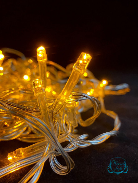 Занавес с мерцающим диодом 2*2 м., 220V, 240 желтых LED ламп, прозрачный провод, Winner Light (Y.03.5T.240+) 